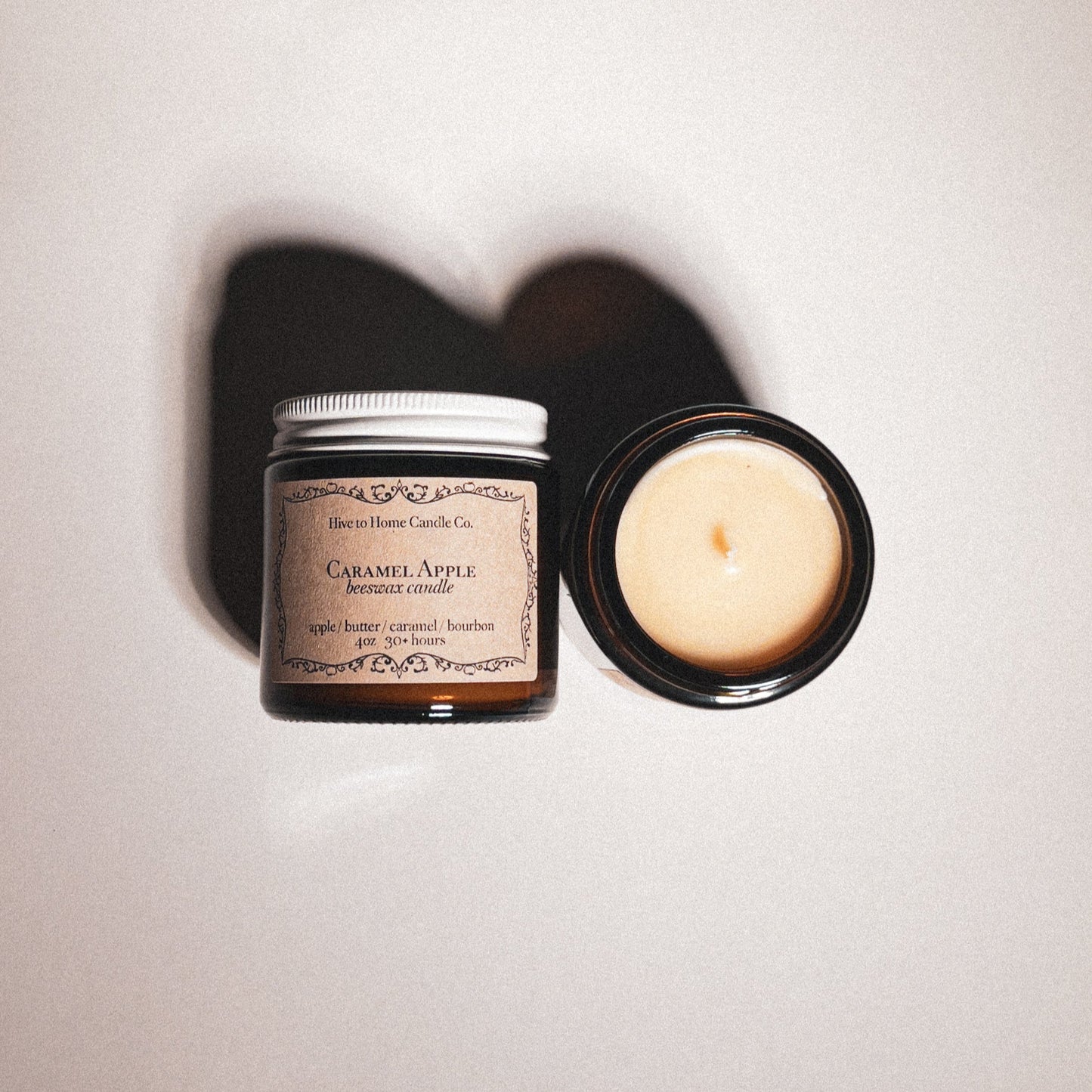 4 oz Caramel Apple Fall Beeswax Candle with top of beeswax candle.