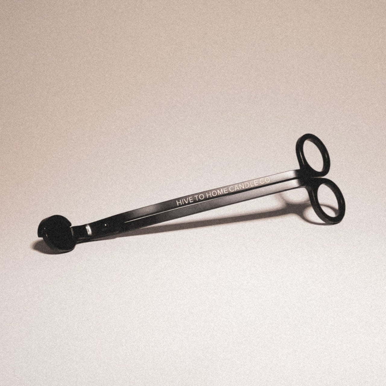 Candle wick trimmer for candle care, Laser engraved with Hive To Home Candle Co's company logo.