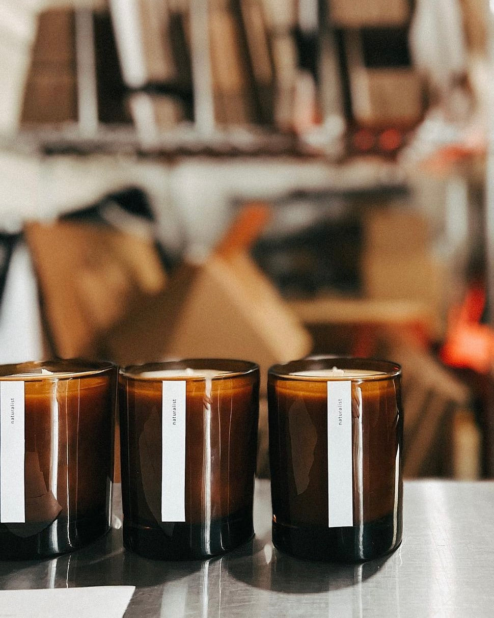 beeswax candles in the candle shop after bring labeled.