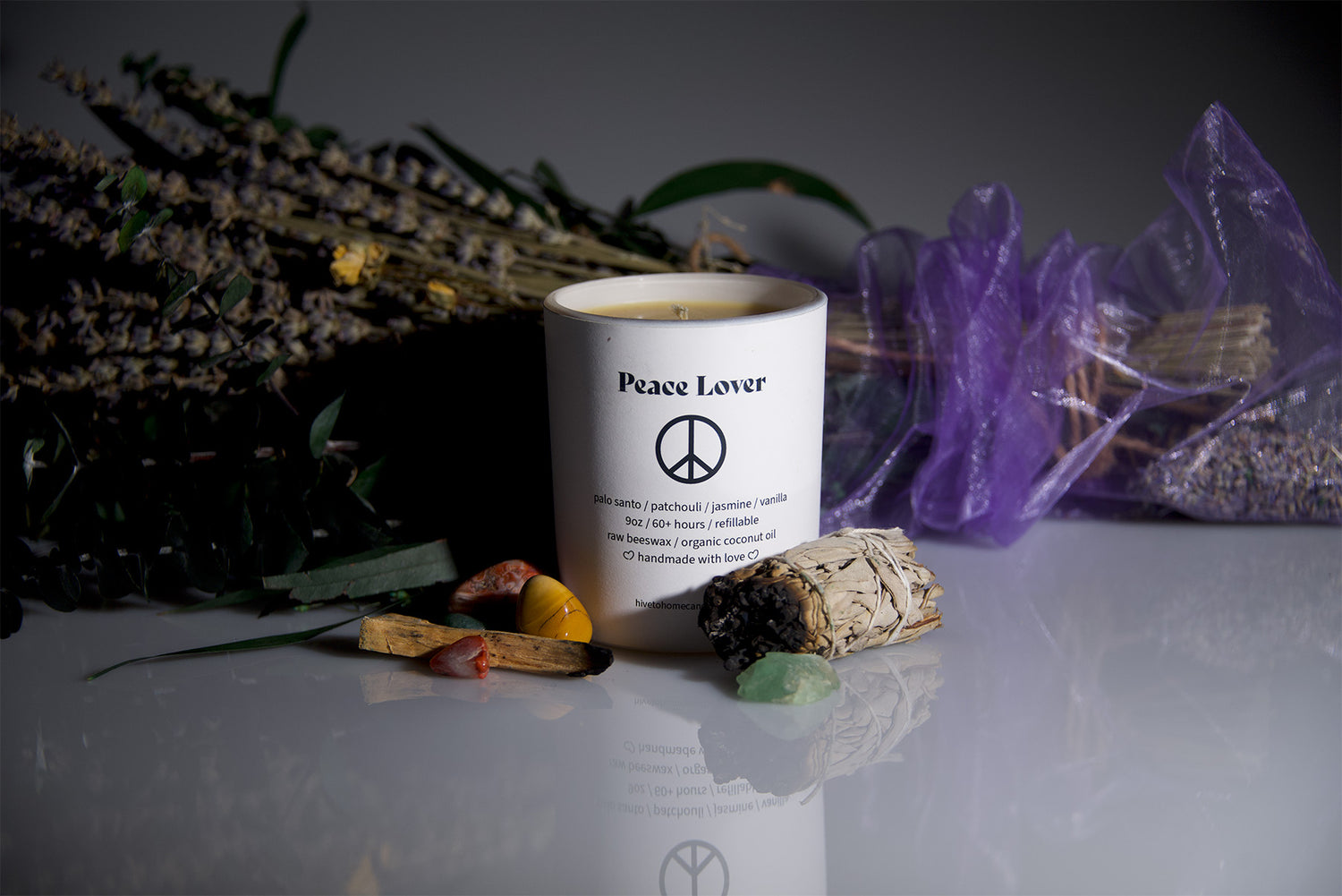 Peace Lover. Palo Santo & patchouli candle with undertones of jasmine & vanilla. Hive To Home Candle Co's Scent guide.