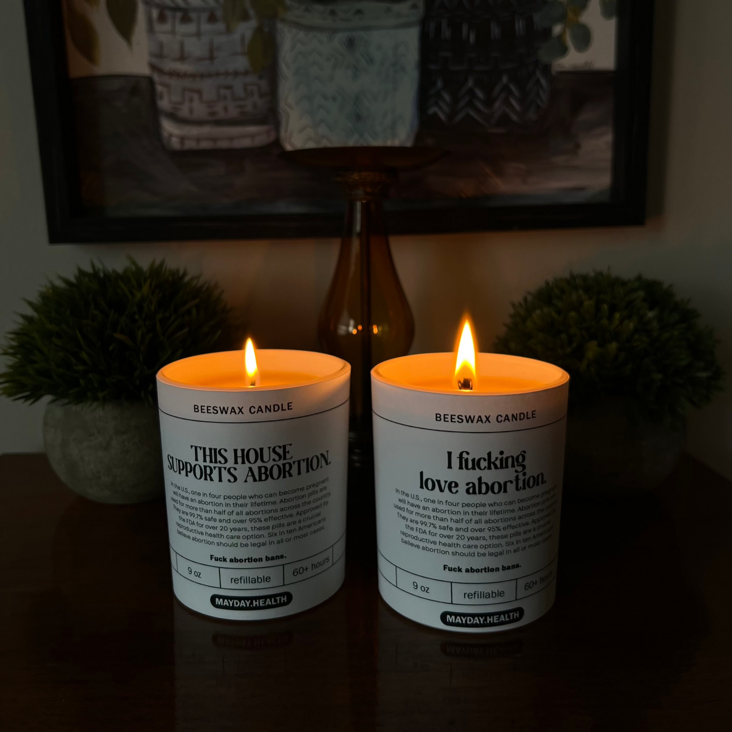 This house supports abortion and I fucking love abortion candles both burning. Mayday Health and Hive To Home Candle Co