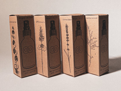 Dope Mist: Essential Oil Linen Spray collection, Eucalyptus, Patchouli, Lavender, & Cedar wood. In outer packaging hand-stamped with carbon-negative algae ink.