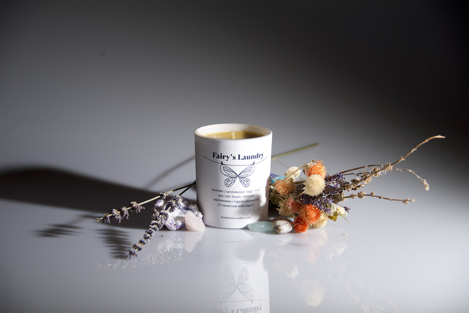 Fairy's Laundry. Beeswax candle with lavender & sandalwood with hints of fresh linen and sage. Featured candle image for Hive To Home Candle Co's candle scent guide.