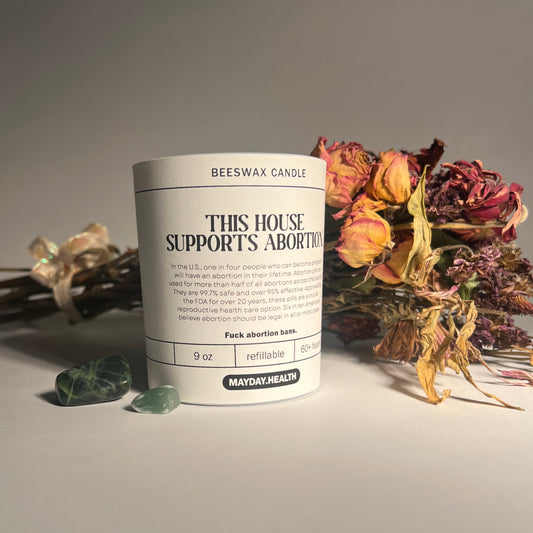 This house supports women candle partnered with Mayday Health from Hive To Home Candle Co. Feminist candle
