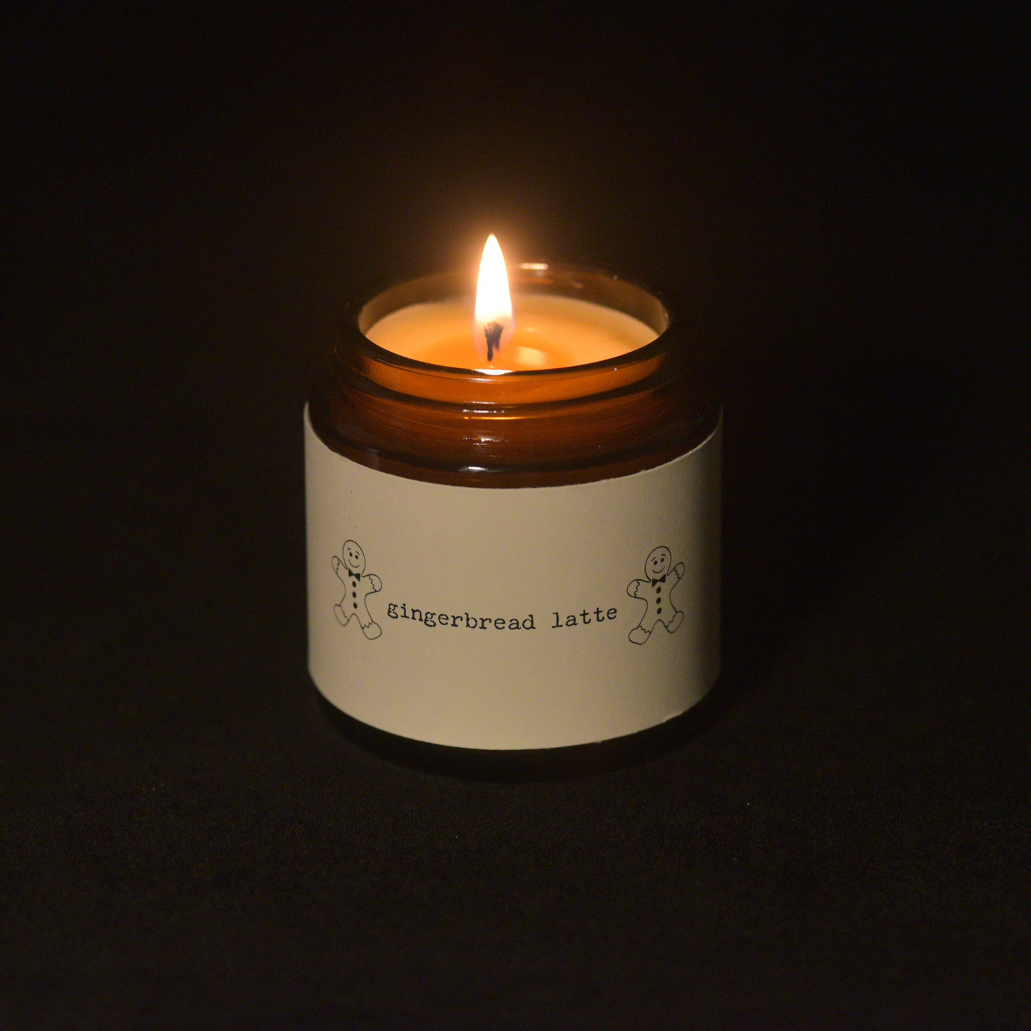 Gingerbread scented candle. Gingerbread man festive candle 4 oz amber