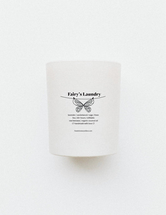 Fairies Laundry, lavender, sandalwood, sage, and linen beeswax candle. Refillable candle tumbler white jar